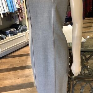Sheer wool blend sheath dress with satin piping. Zip back